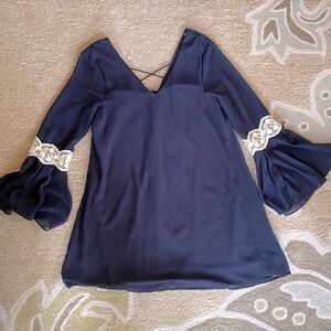 Umgee size medium navy blue dress, lace inset long sleeve v-neck short